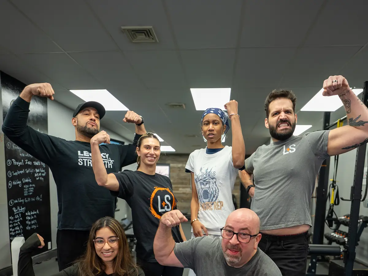 Members and coaches together at Legacy Strength